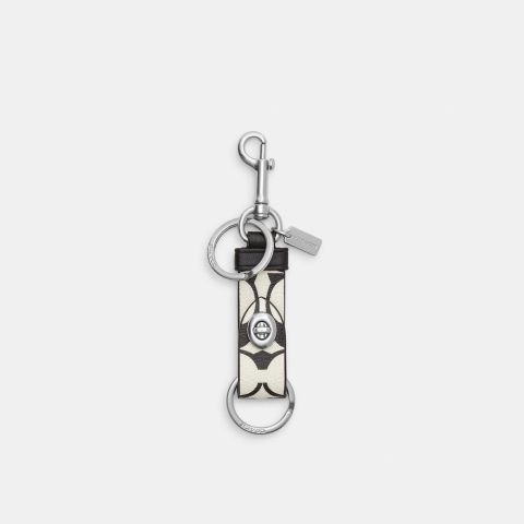 Coach Outlet Trigger Snap Bag Charm In Signature Canvas 7231247745084